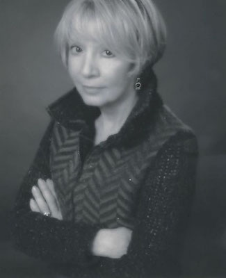 A black and white photo of Judi